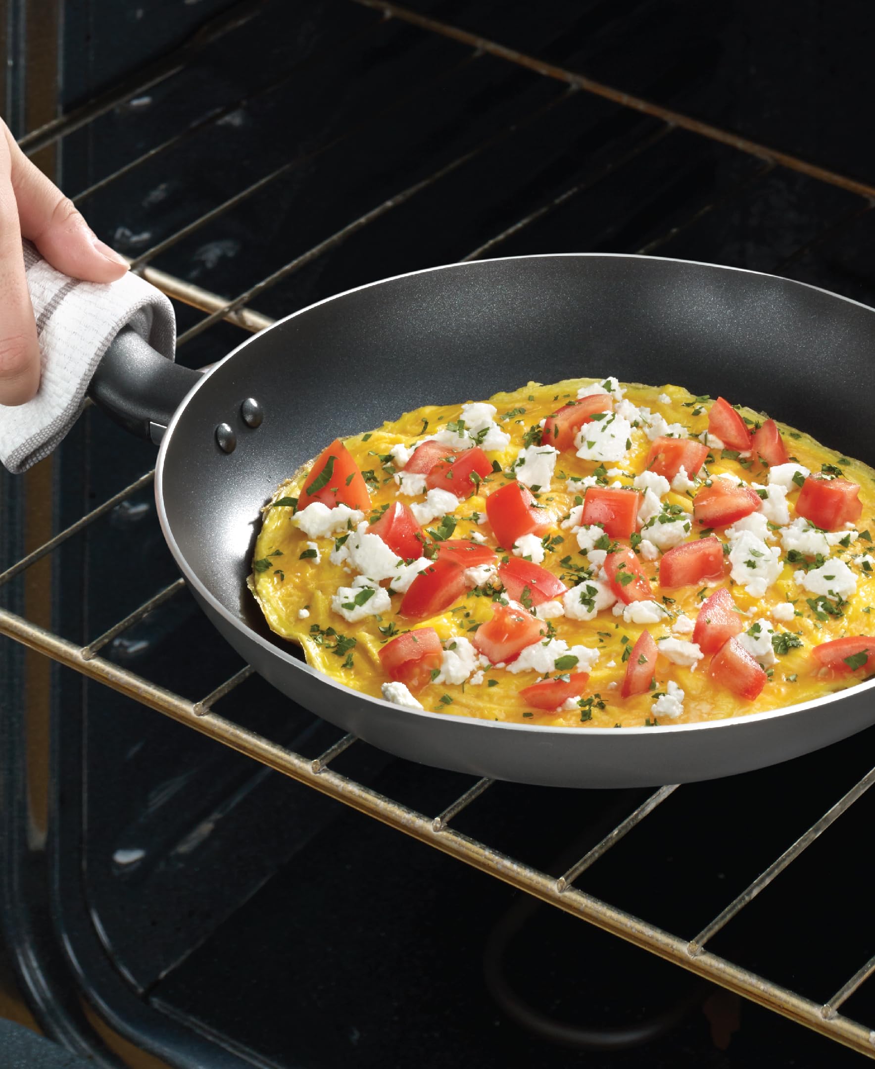 T-Fal vented glass lid close-up showing visibility while trapping heat and moisture benefit