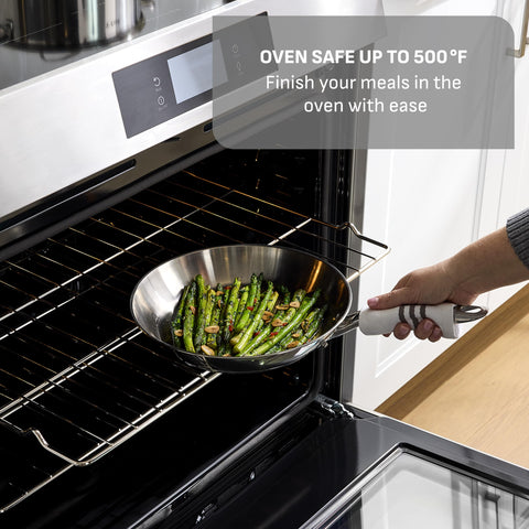 T-Fal pan inside oven demonstrating oven-safe use up to 500°F for finishing dishes