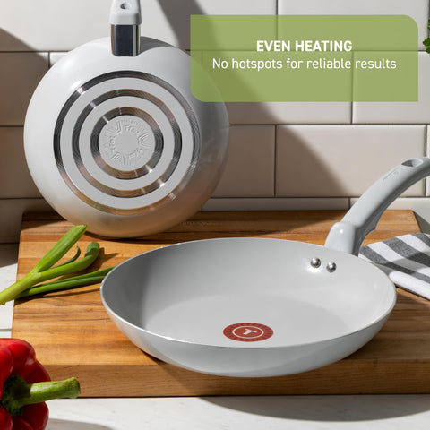 T-Fal full kit laid out with pans, lids, and utensils, complete set for everyday meals