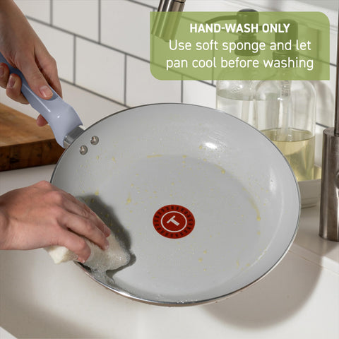 T-Fal pans next to utensils showing scale, compact storage and matched accessories