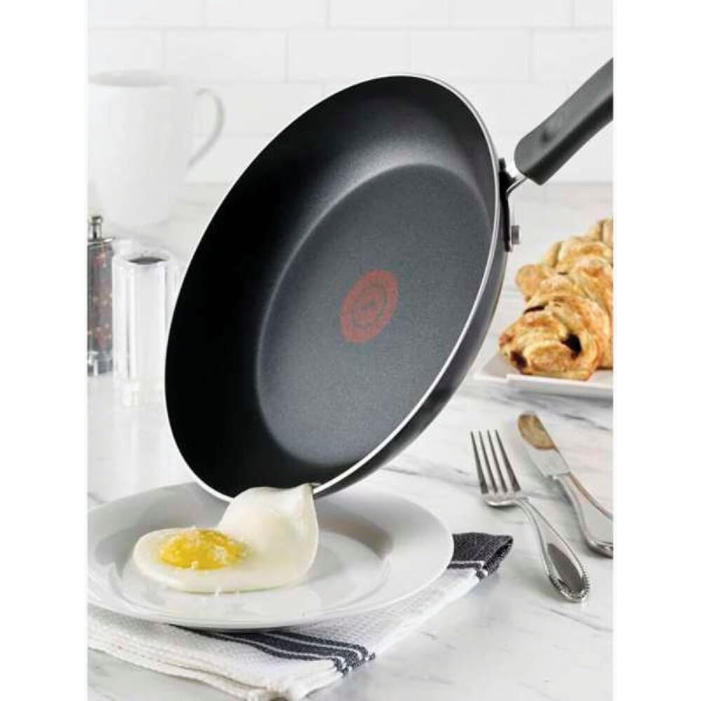 T-Fal pan in use on stovetop for even heating and easy browning