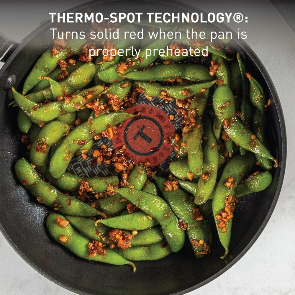 T-Fal even-heat base and anti-warp profile for consistent cooking and long-lasting performance