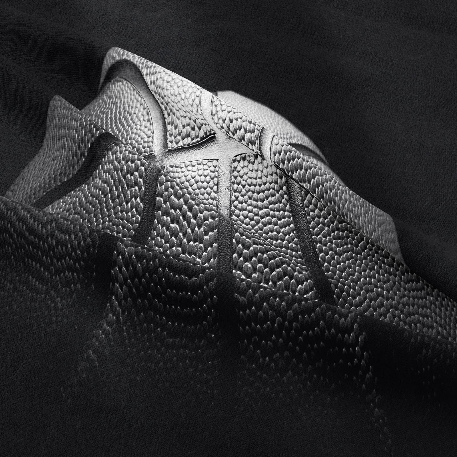 Tailor Shop comforter on twin bed in a bedroom illustrating sporty styling benefit