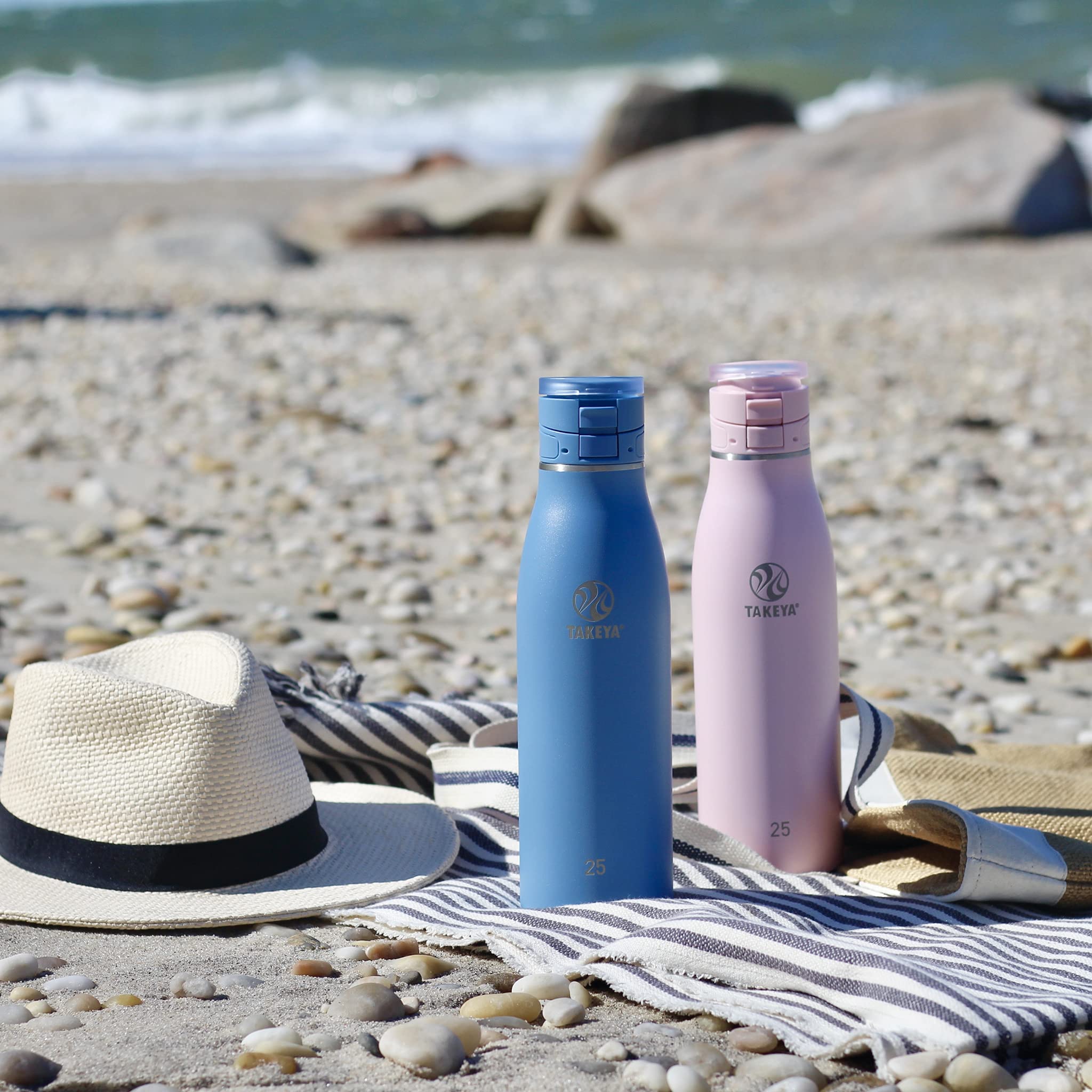 Takeya Traveler on picnic blanket showing durable stainless steel for outdoor use
