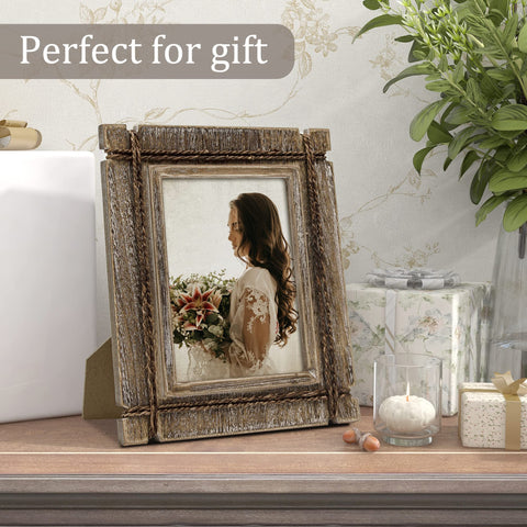 takfot frames displayed on a mantel adding cozy decorative warmth