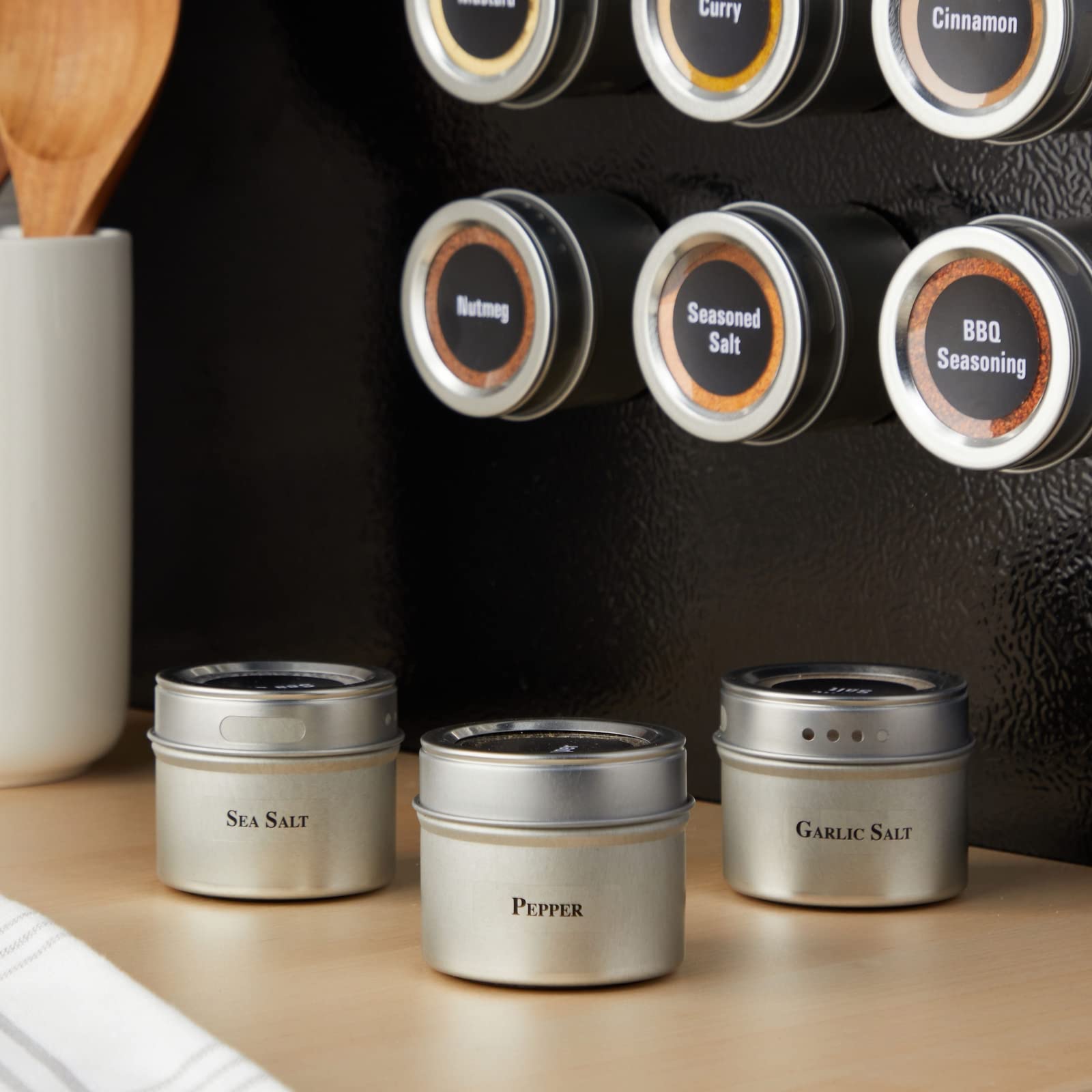 Talented Kitchen magnets holding tins on refrigerator for instant access and space saving