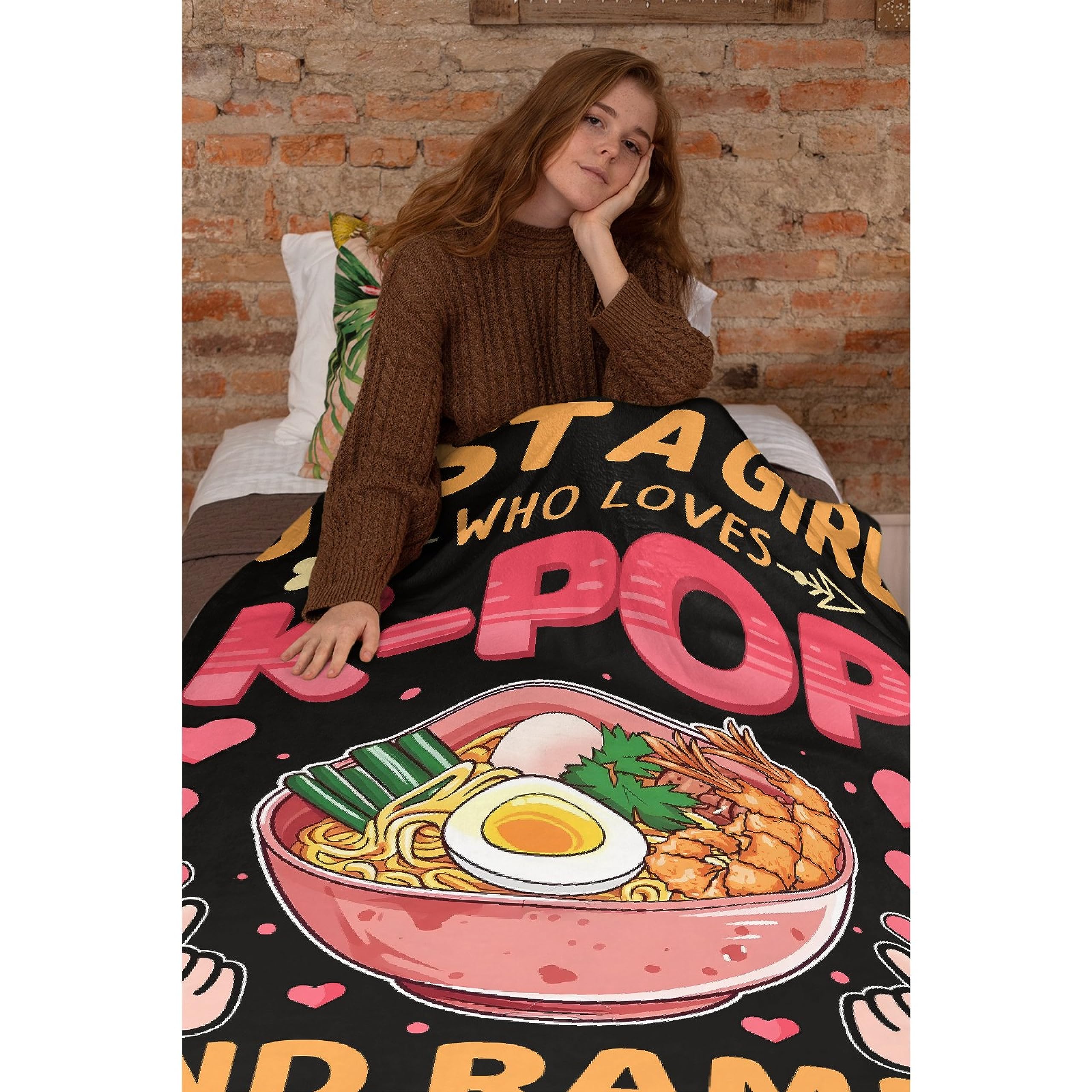 Tamonten blanket wrapped around person reading, provides lightweight warmth