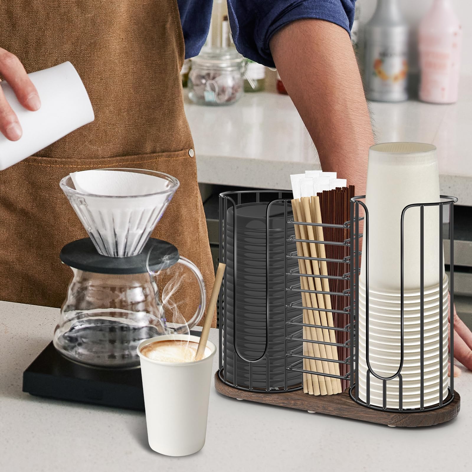 Tanggiteck beside an 18oz cup showing size fit and compact countertop footprint