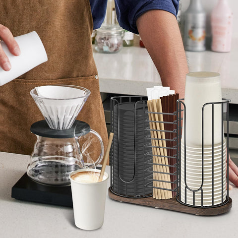 Tanggiteck beside an 18oz cup showing size fit and compact countertop footprint