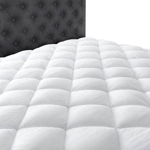 Taupiri mattress pad in use on a bed illustrating added cushioning and breathable comfort