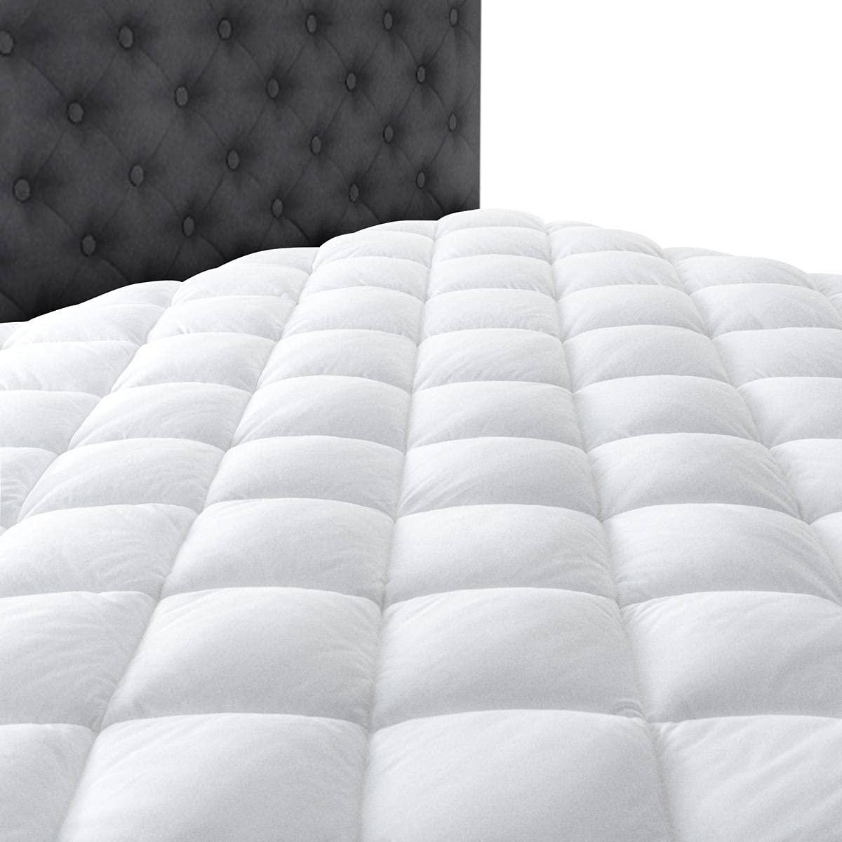 Taupiri pad on full mattress in bedroom scene adding plush layer