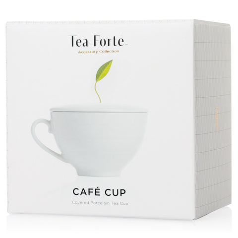 Tea Forte café cup lid close-up revealing viewing hole and snug fit, preserves aroma while steeping