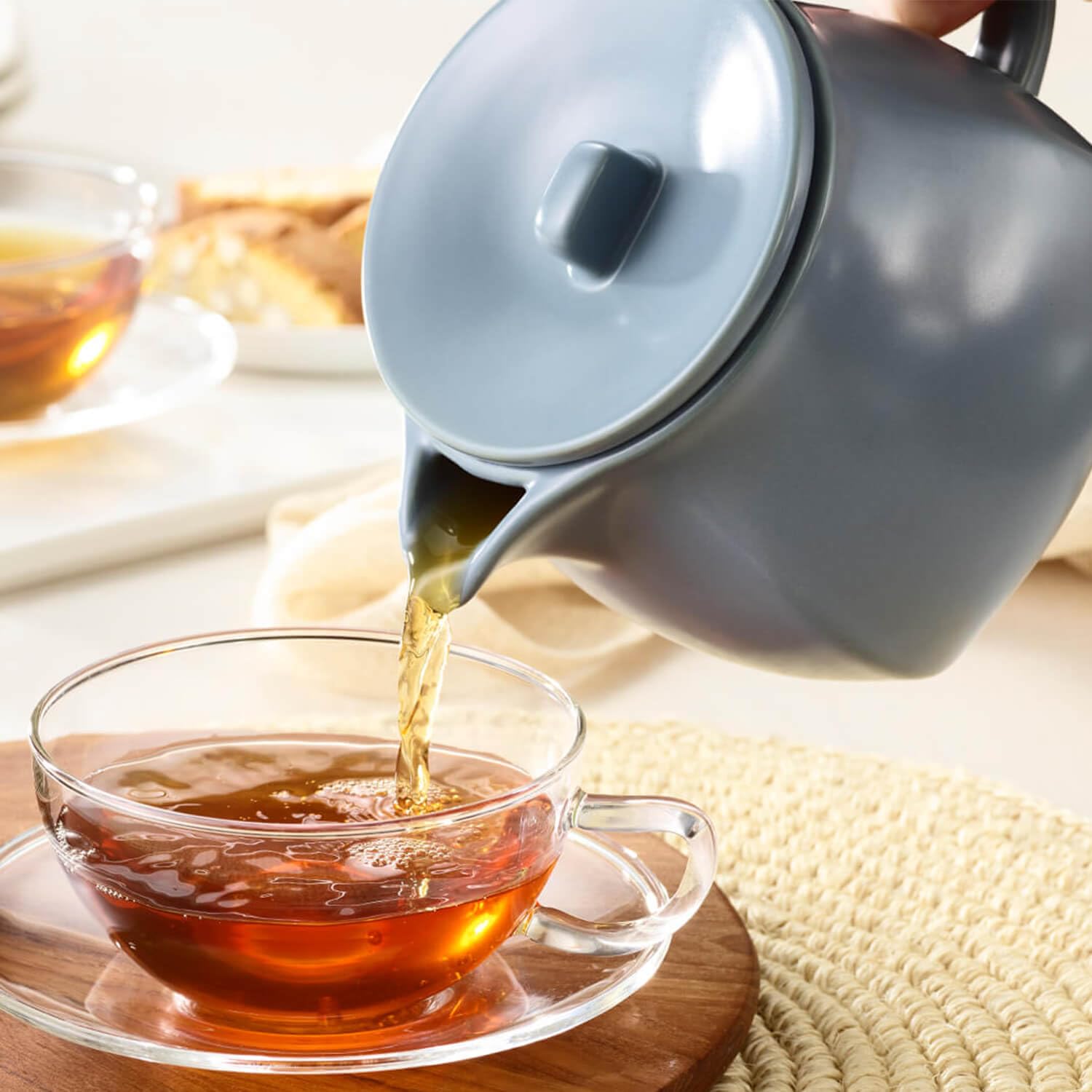 Tea Forte snug ceramic lid detail retaining heat and secure fit