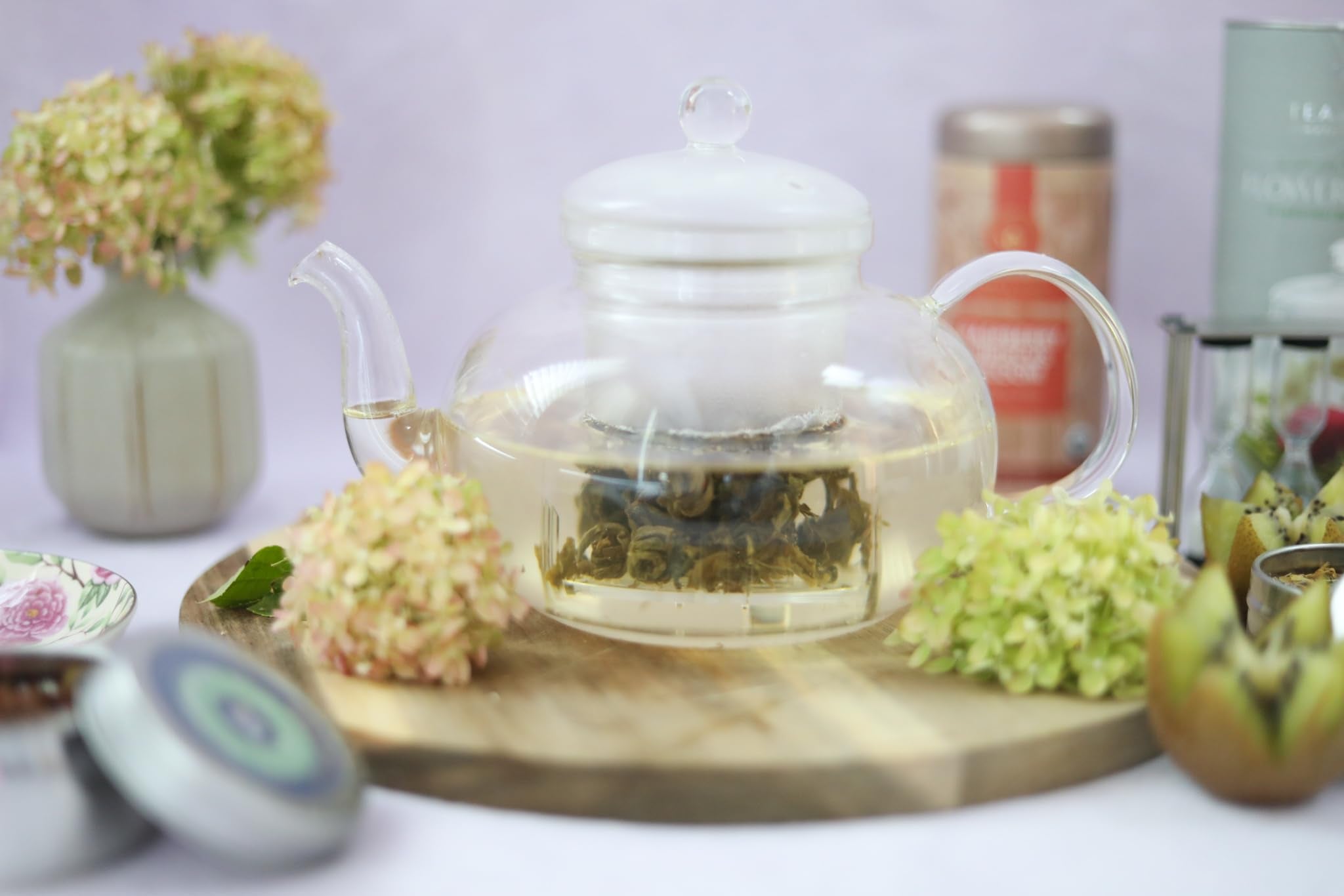Teabloom Blossoms four glass teacups arranged on tray benefit: serves up to four guests