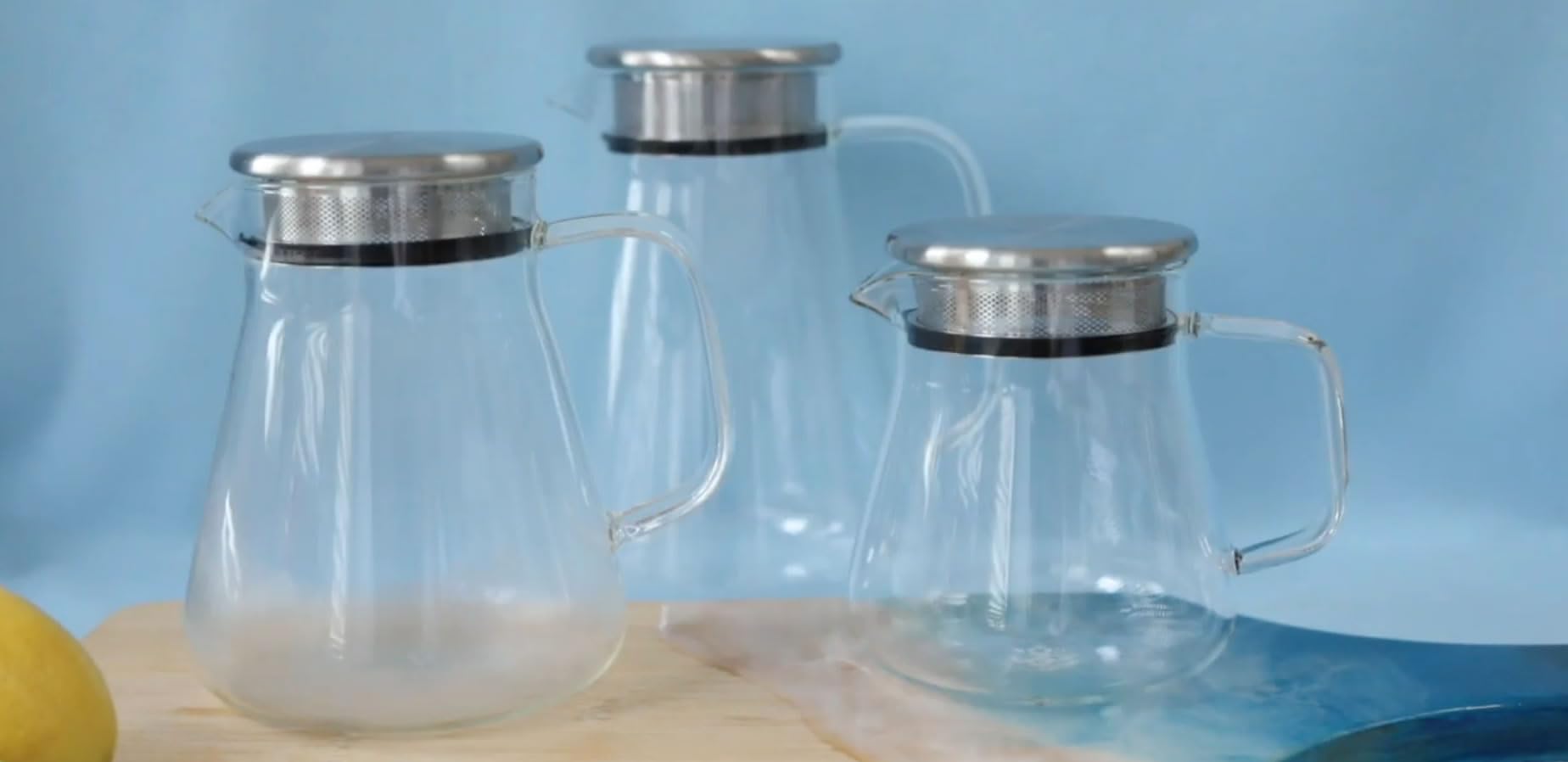 Teabloom silicone ring on lid securing filter while pouring safely