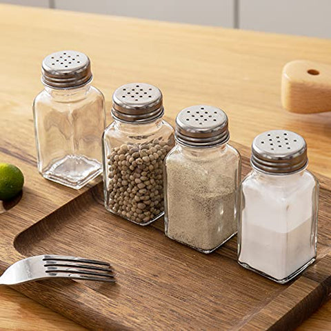 Tebery shakers placed on a restaurant table enhancing professional presentation