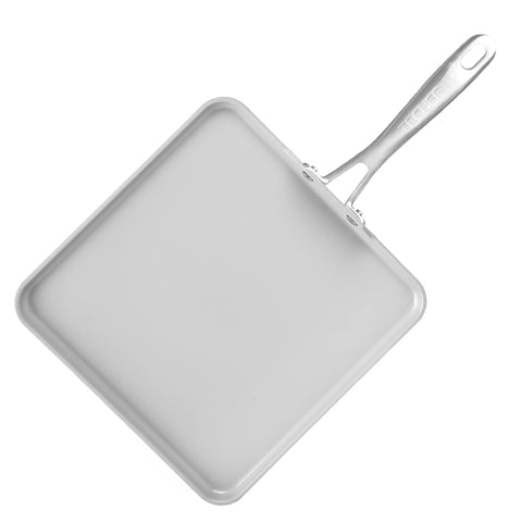 TECHEF griddle size comparison with eggs showing large surface for batch cooking benefit