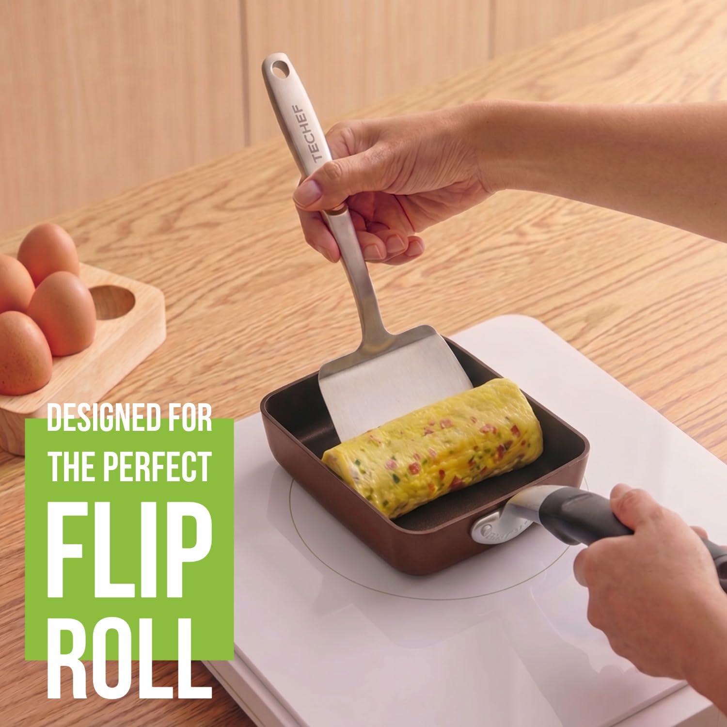 TECHEF pan in use rolling tamagoyaki showing precise control benefit