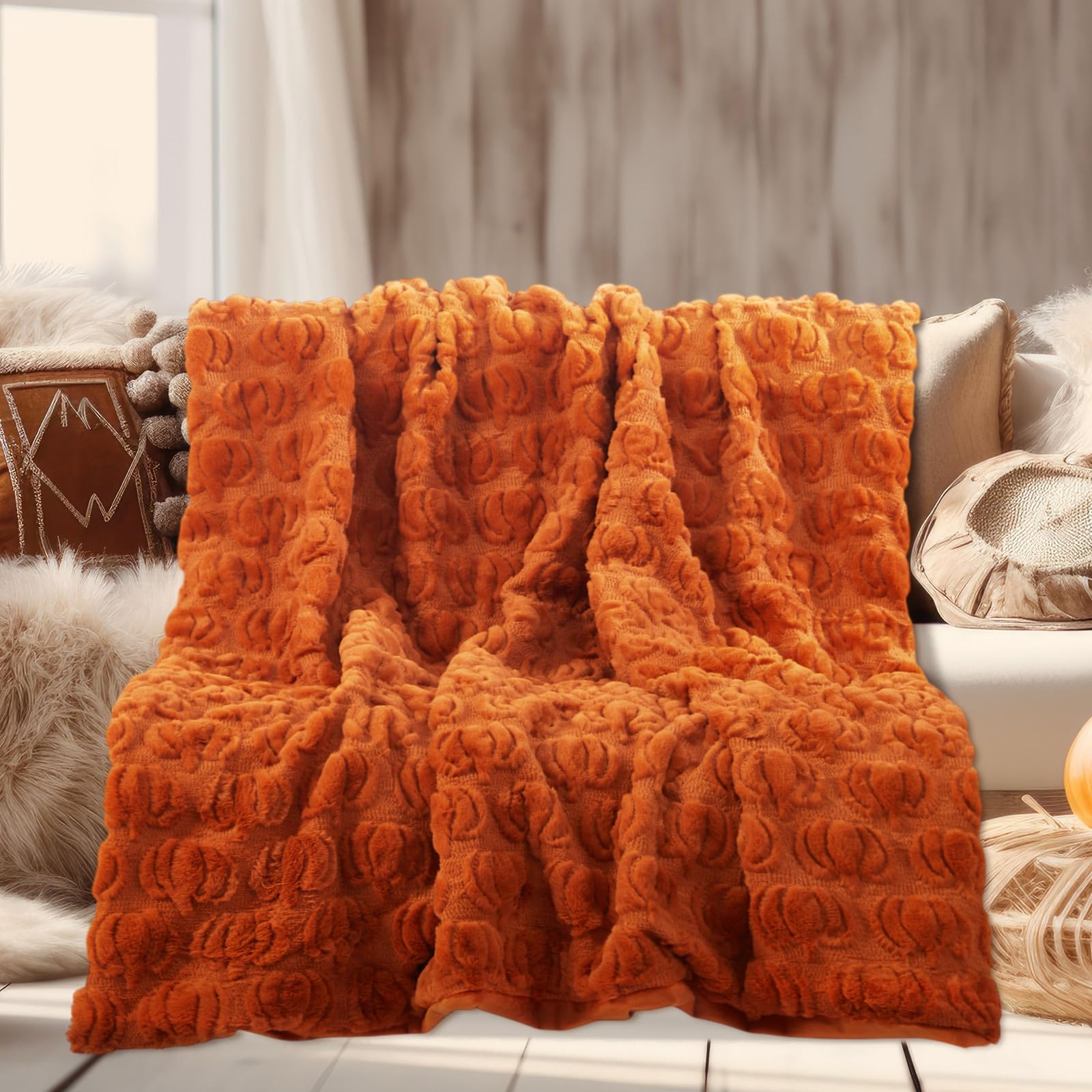 Tegeme draped over bed footboard, creates cozy bedroom atmosphere