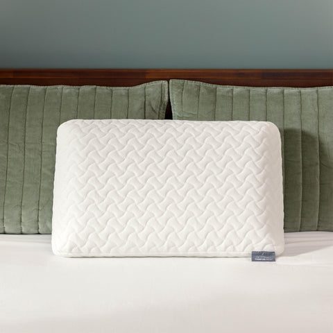 Tempur-Pedic on bed under sheets illustrating how it fits standard pillowcases