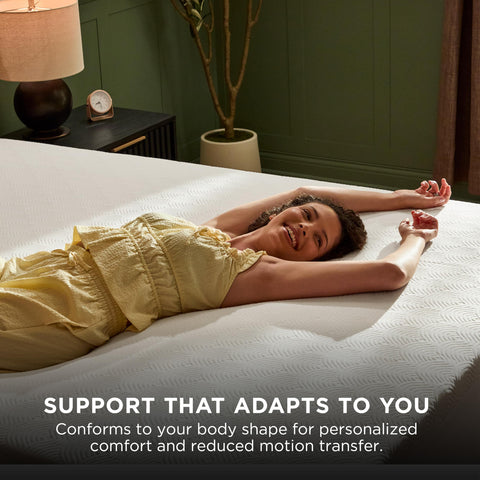 Tempur-Pedic topper on queen bed in bedroom setting showing improved sleep surface and comfort