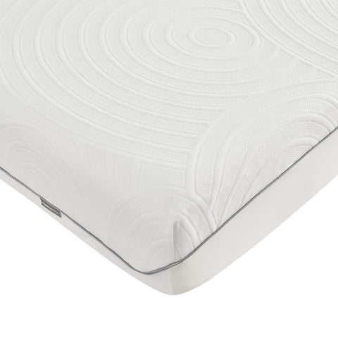 Tempur-Pedic protector on king mattress in bedroom demonstrating protection