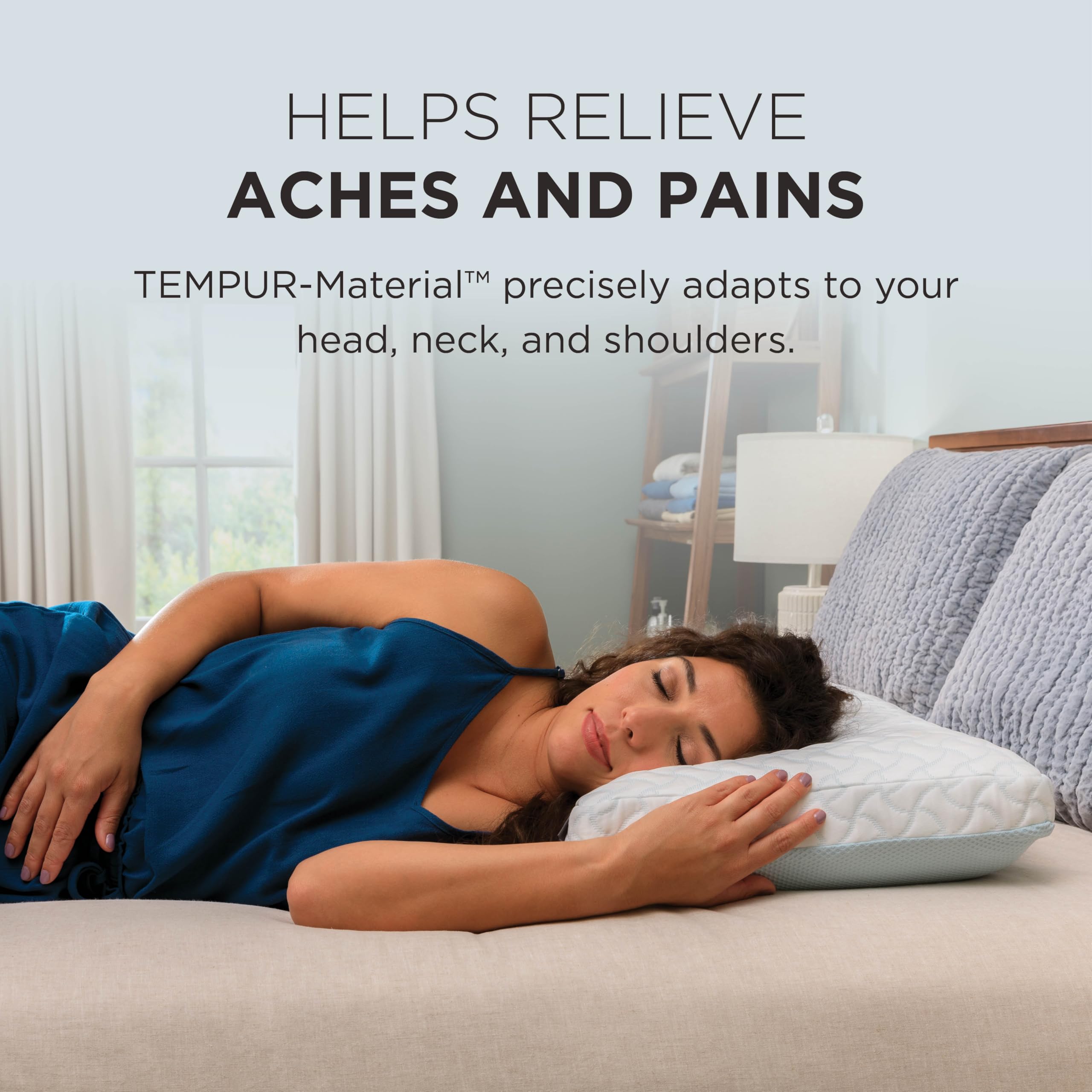 Tempur-Pedic pillows arranged on bed, illustrating sleep-ready comfort for couples