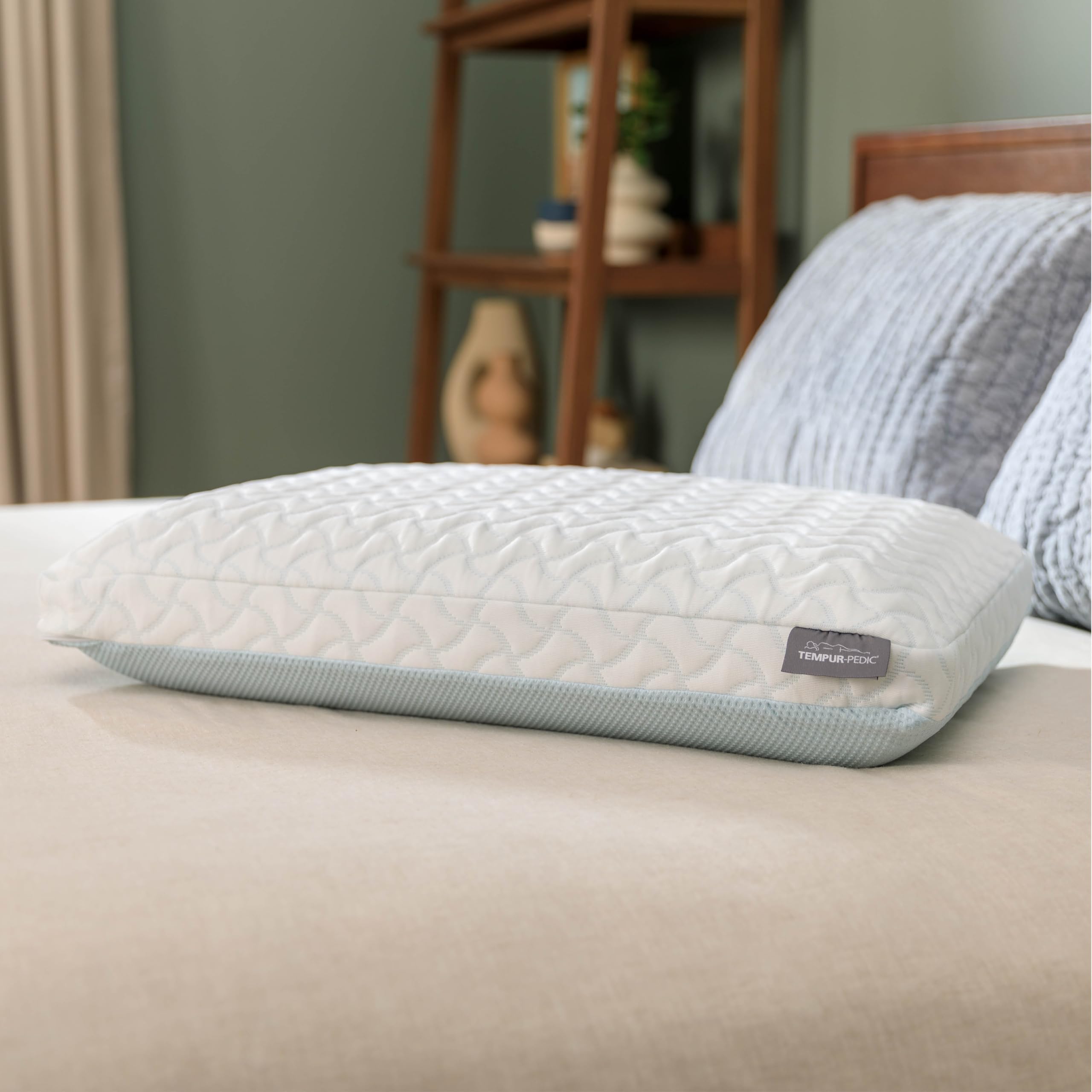 Tempur-Pedic side view showing low-profile pillow, supports neck alignment
