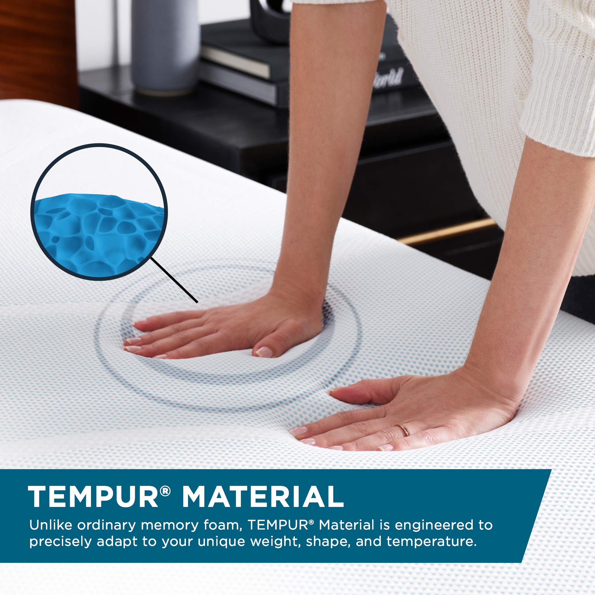 Tempur-Pedic next to a water bottle for size comparison and compactness