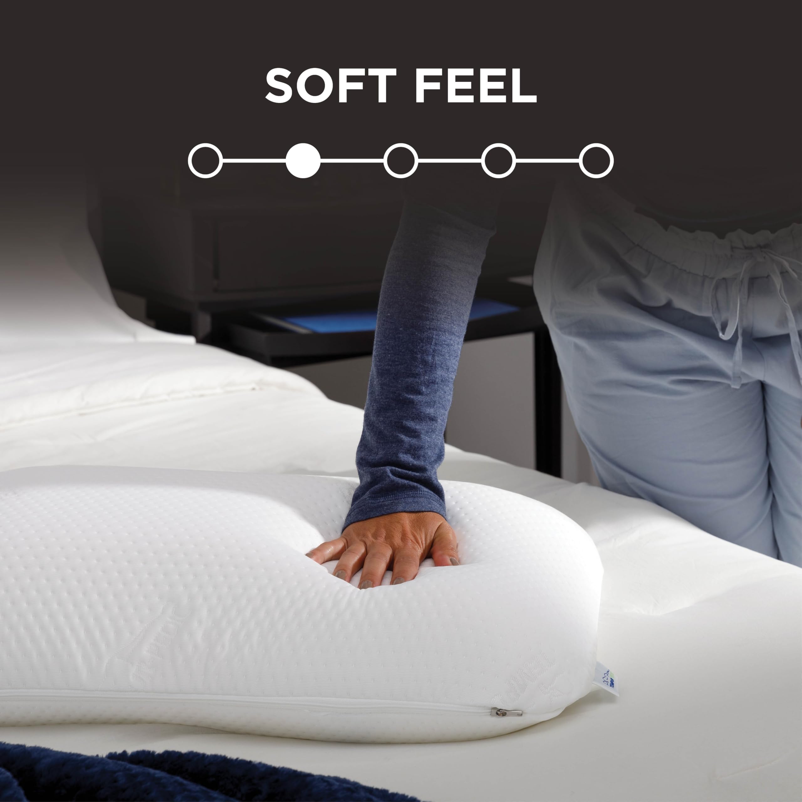Tempur-Pedic pillow supporting side sleeper shoulder alignment and pressure relief