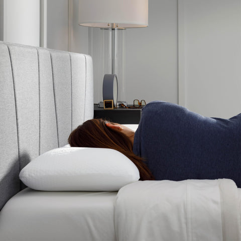 Tempur-Pedic pillow on stomach sleeper illustrating reduced loft comfort benefit
