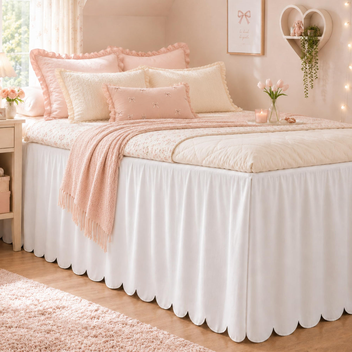 Tenceur front view showing full white scalloped bed skirt benefit neat coverage