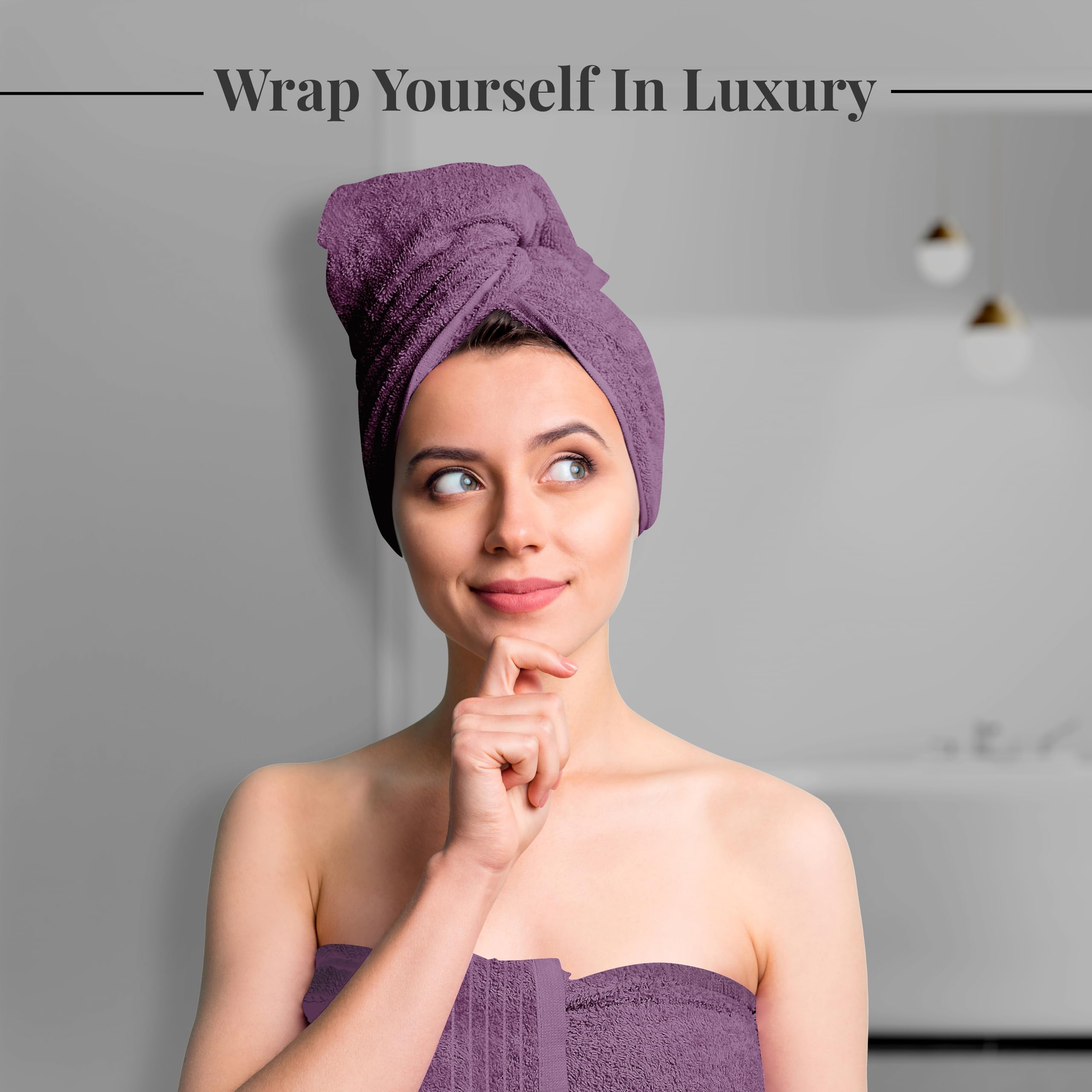 Tens Towels staged in bathroom, purple towels add color and quick-dry convenience