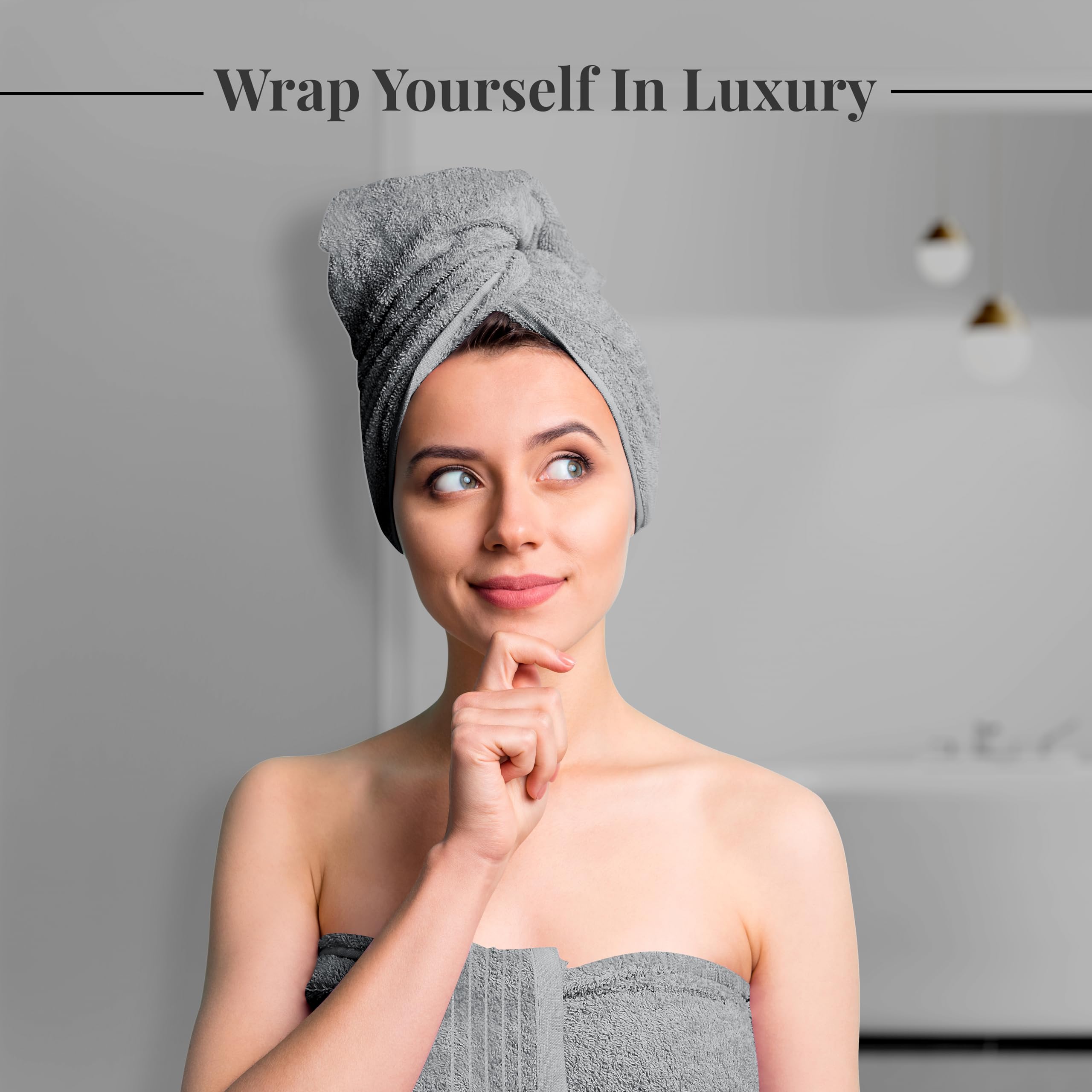 Tens Towels folded stack in bathroom emphasizing space-saving and style
