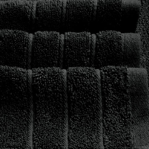 Tens Towels wrapped around adult demonstrating absorbent, quick-dry comfort