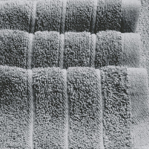 Tens Towels packed in gym bag illustrating lightweight portability and convenience