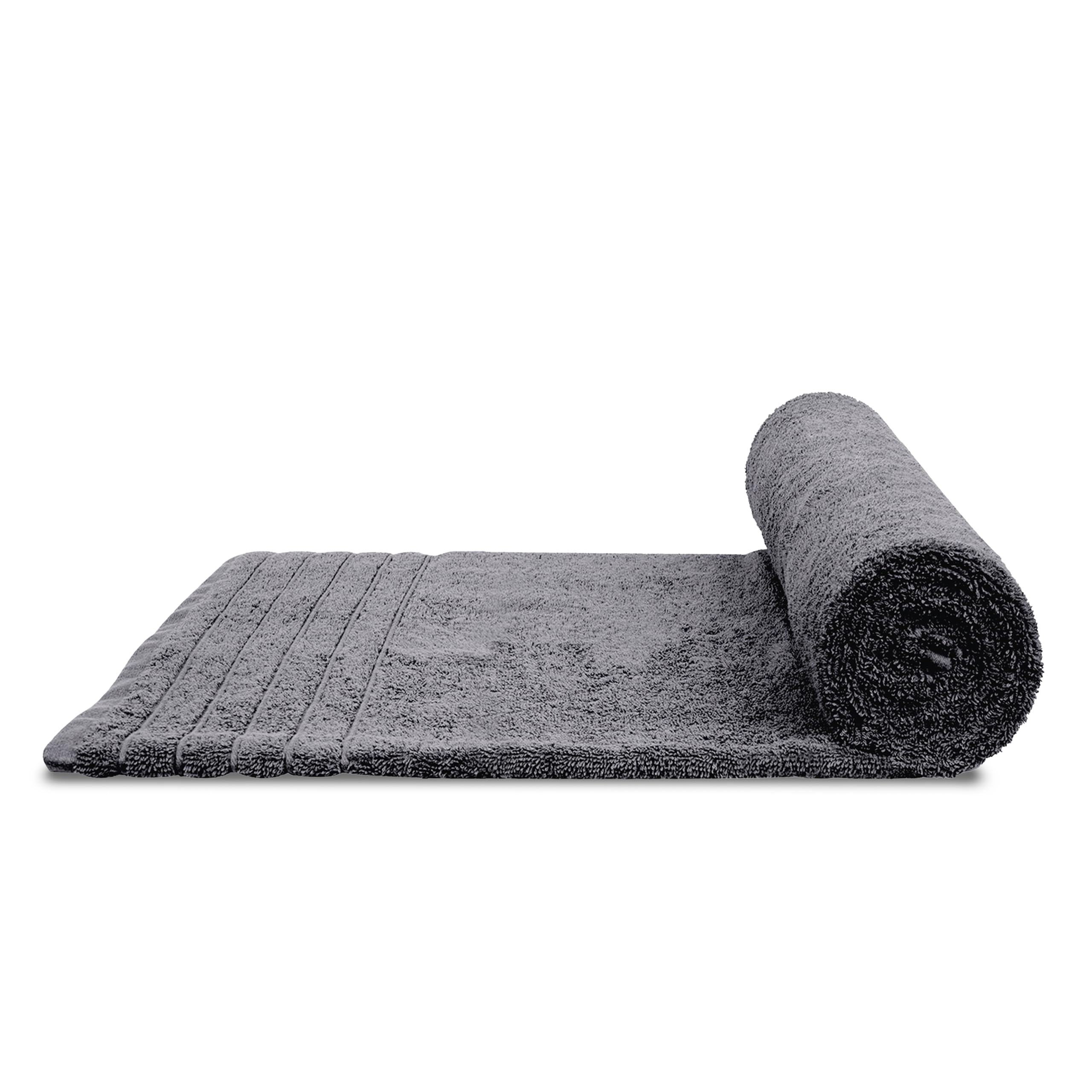 Tens Towels folded inside suitcase showing travel-friendly lightweight design