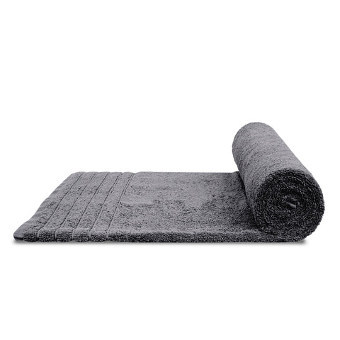 Tens Towels folded inside suitcase showing travel-friendly lightweight design