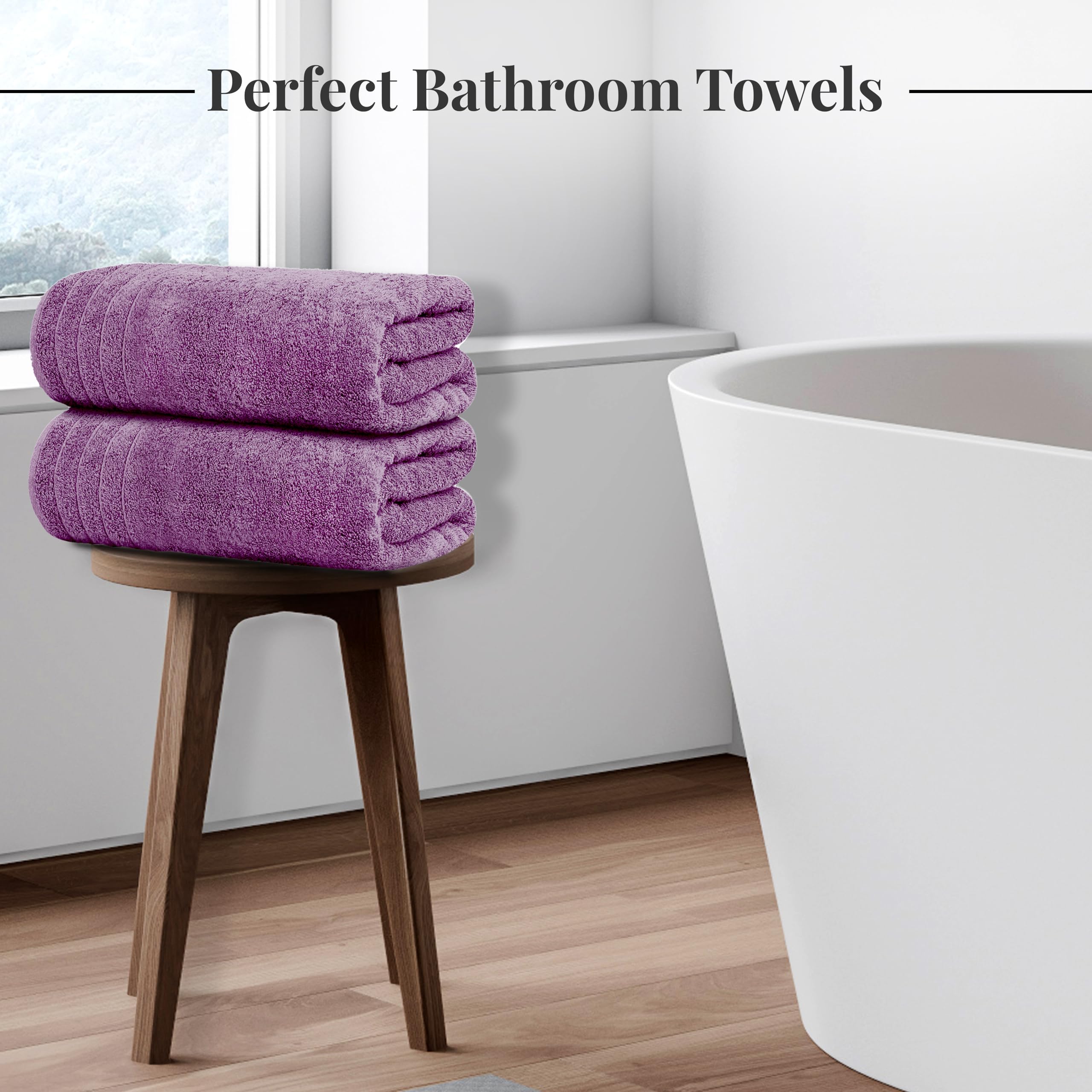 Tens Towels hanging on door showing 30 x 60-inch scale for sizing clarity
