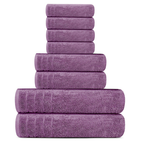 Tens Towels folded stack beside ruler, shows extra-large and compact packing benefit
