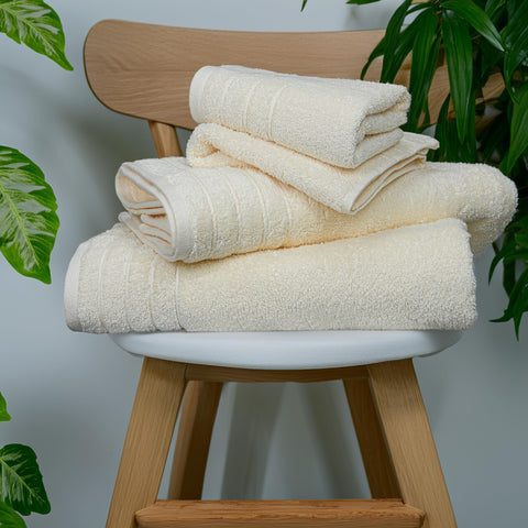 Tens Towels spread to illustrate sizes and extra-large bath towel coverage
