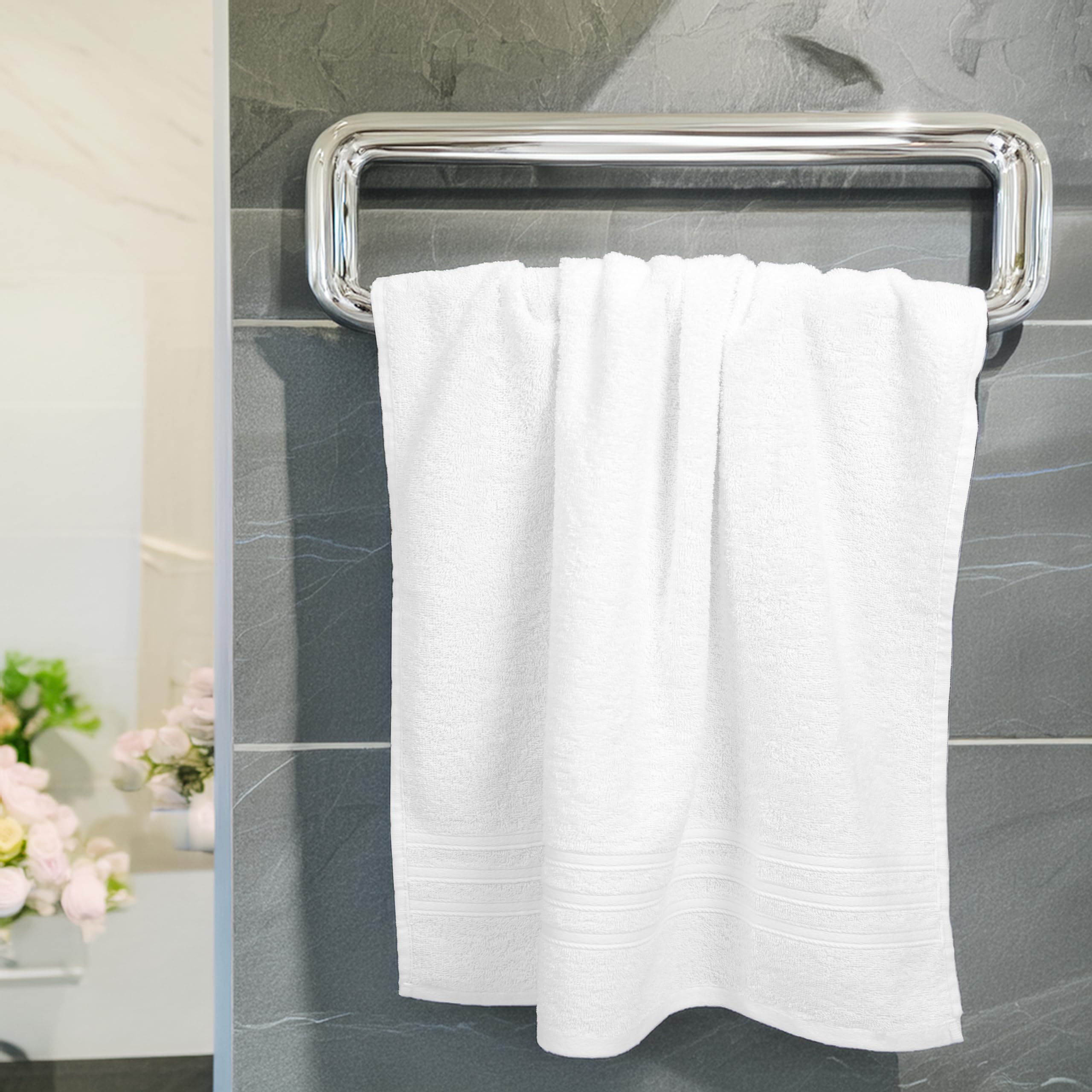 Tens Towels stacked in linen closet showing compact storage benefit