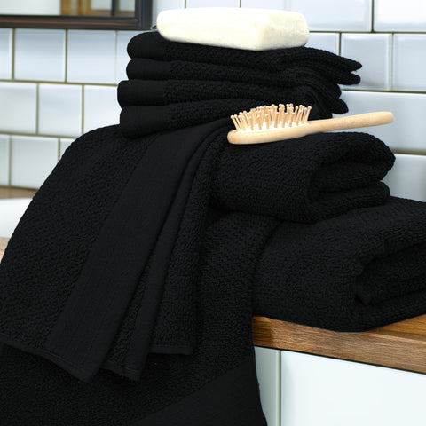 Tens Towels extra-large bath towel spread out to show size and full coverage