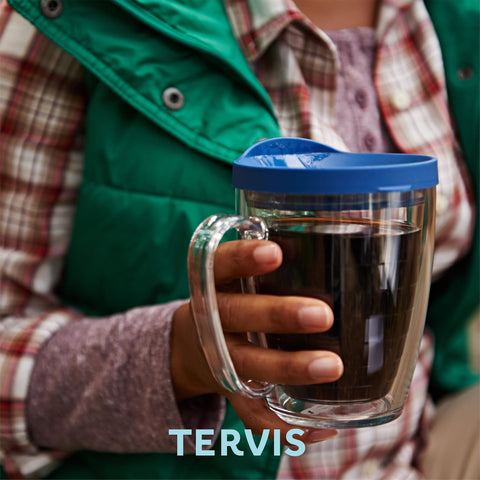 Tervis mug held for scale demonstrating the 16oz capacity