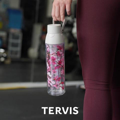 Tervis Sakura seated in car cup holder for secure travel convenience