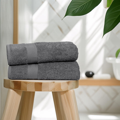TEXCRAFT towel absorbing water from glass to demonstrate fast absorbency