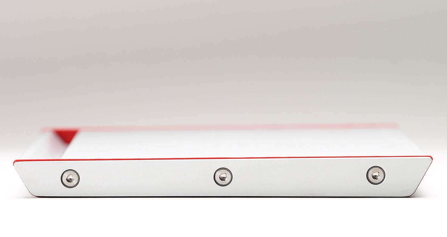 THAT INVENTIONS ThawTHAT! tilted edge and drip tray catching melt for cleaner counters