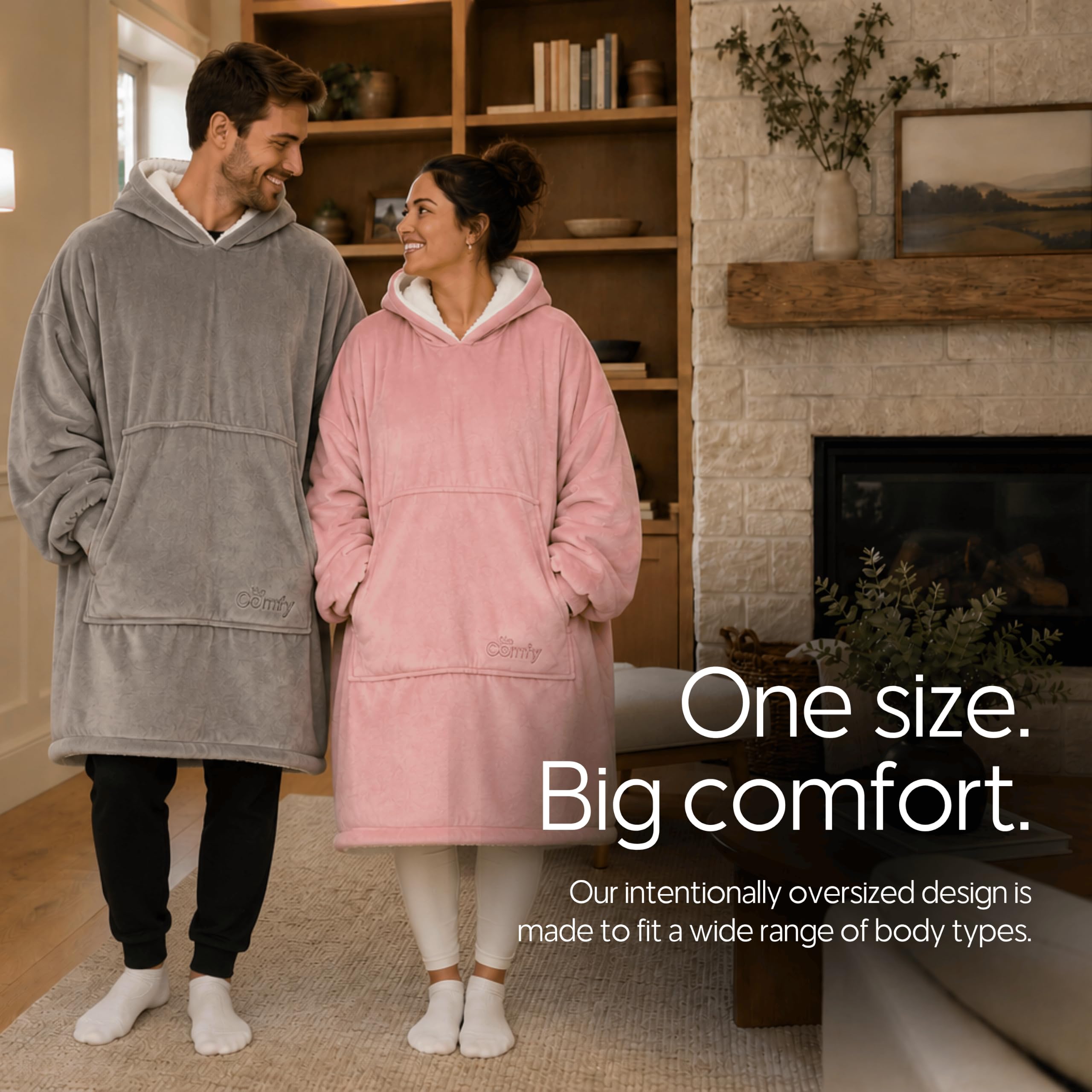 Person wearing THE COMFY on a couch using a laptop demonstrating comfort and hands-free use