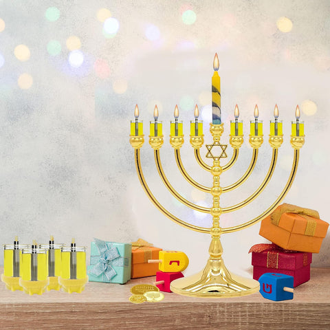 The Dreidel Company cups lit in a menorah during Hanukkah, festive warm lighting benefit