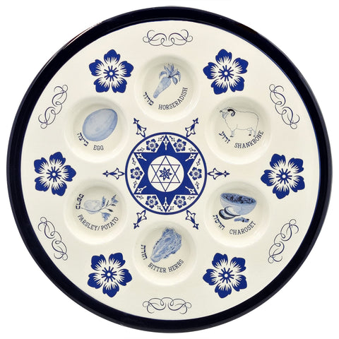 The Dreidel Company Seder plate front view showing blue Renaissance design and six wells for clear ritual presentation